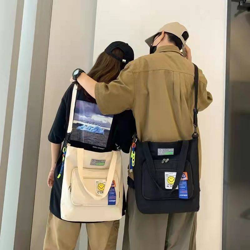 新品情侣单肩斜挎包66