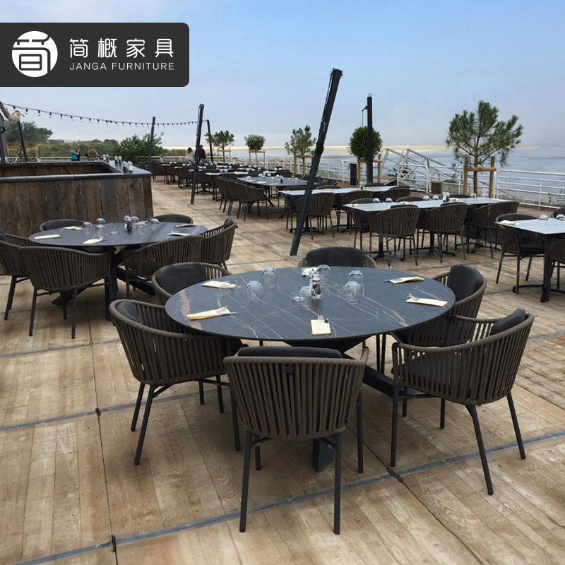 户外别墅庭院桌椅休闲花园阳台家具组合酒店民宿藤椅岩板餐桌椅