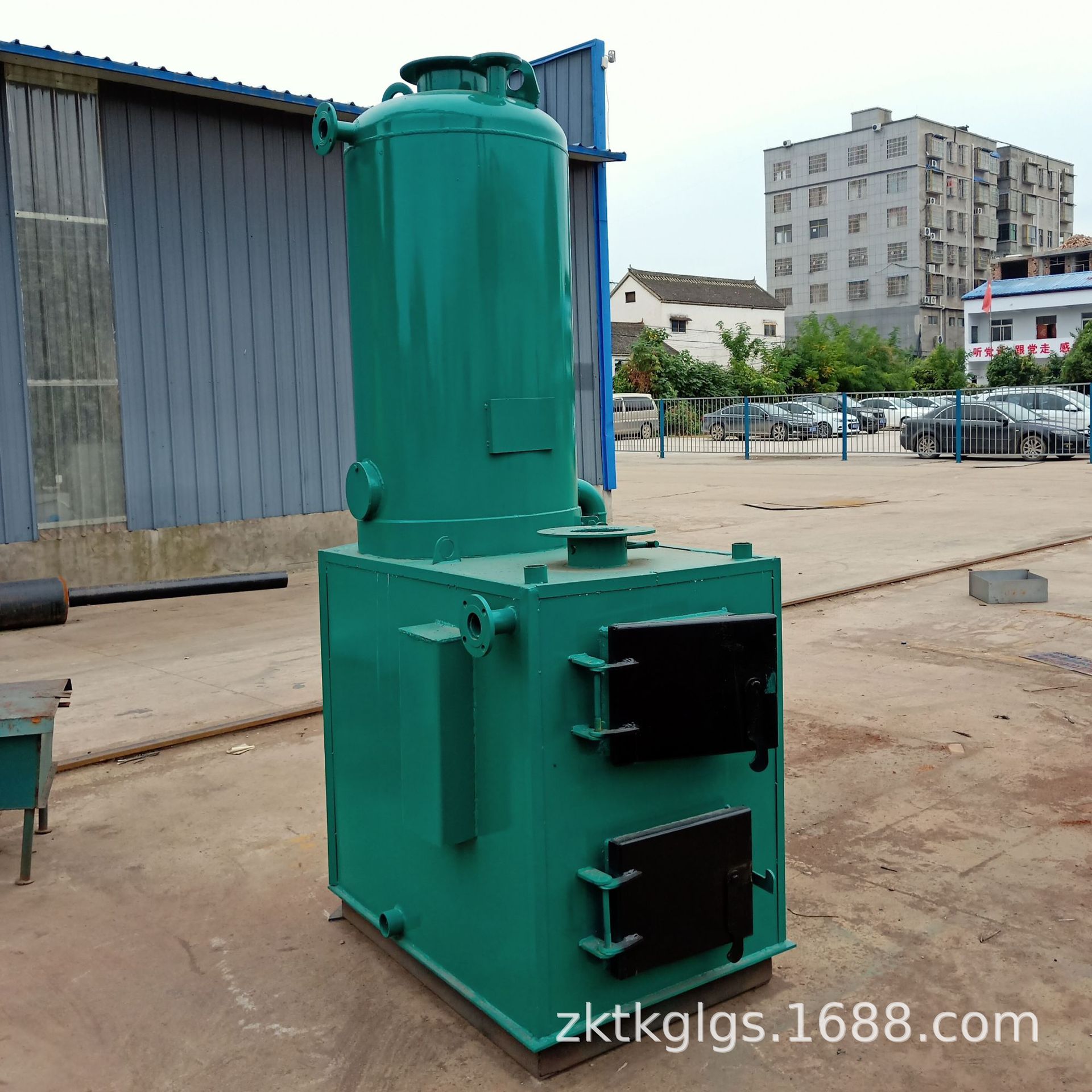 河南常压热水锅炉生产烧木柴 YG-H900燃煤取暖锅炉多少钱