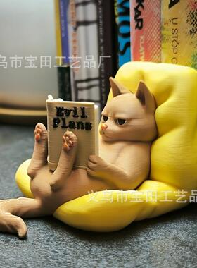 新品阅读猫一个迷人的小雕像一只全神贯注读书的猫咪
