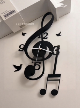 现代简约轻奢音符静音挂钟高级感