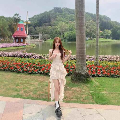 2025茶歇法式初恋不规则荷叶边修身连衣裙仙女夏季款绝美海边长裙