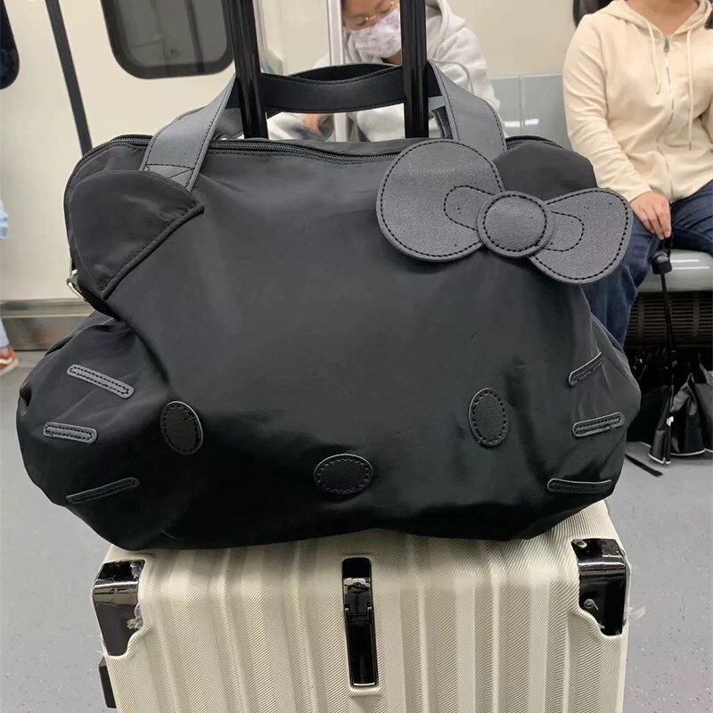 可挂行李箱包大容量短途旅行包学生住校行李包手提斜跨可套拉杆箱图片