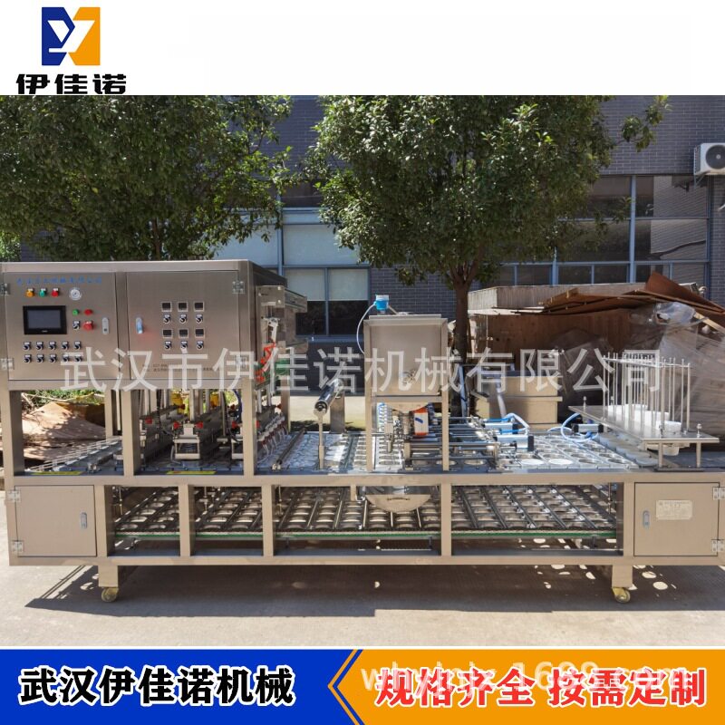 伊佳诺机械一出六碗装八宝粥灌装封口机早餐粥自动灌装封碗机
