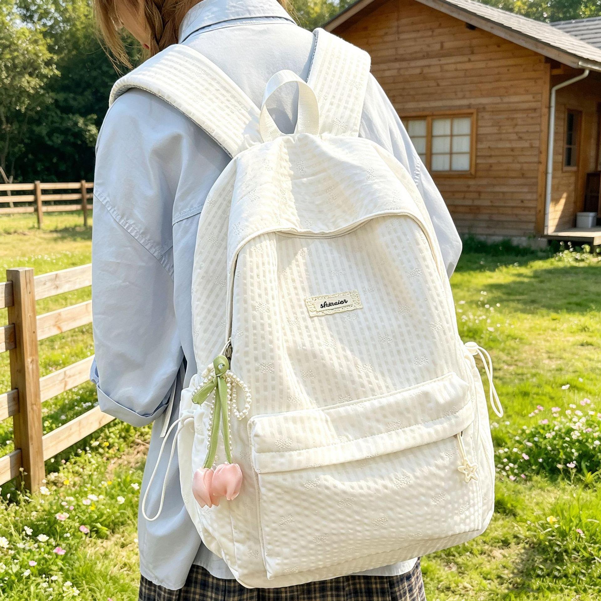 儿童书包小学生女孩初中生高中生高颜值学校背包定制批发双肩包包
