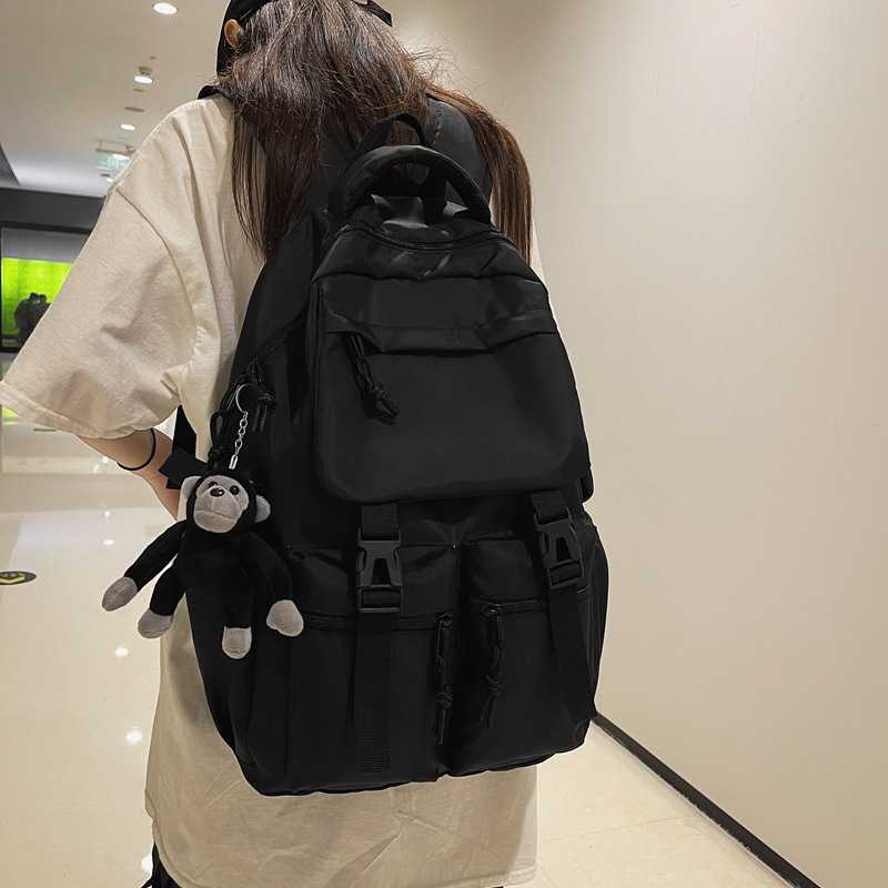 潮酷纯黑书包多袋大容量休闲双肩包时尚新款初高中男女学生背包