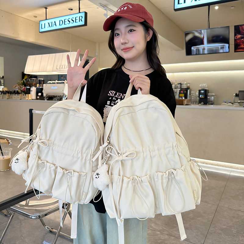 大容量书包女初中生可爱蝴蝶结高中大背包女学生高颜值学院双肩包