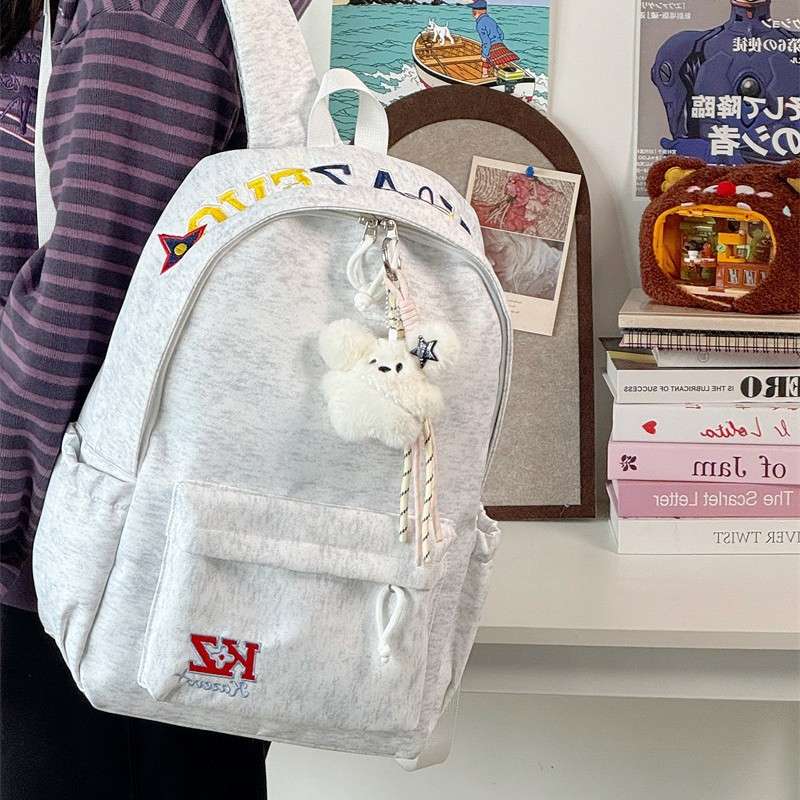 新款字母刺绣学生书包轻便百搭初高中校园背包潮流休闲双肩包