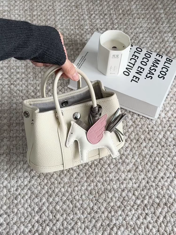 真皮花园托特小包包女2025新款轻奢小众高级感通勤手提单肩斜挎包