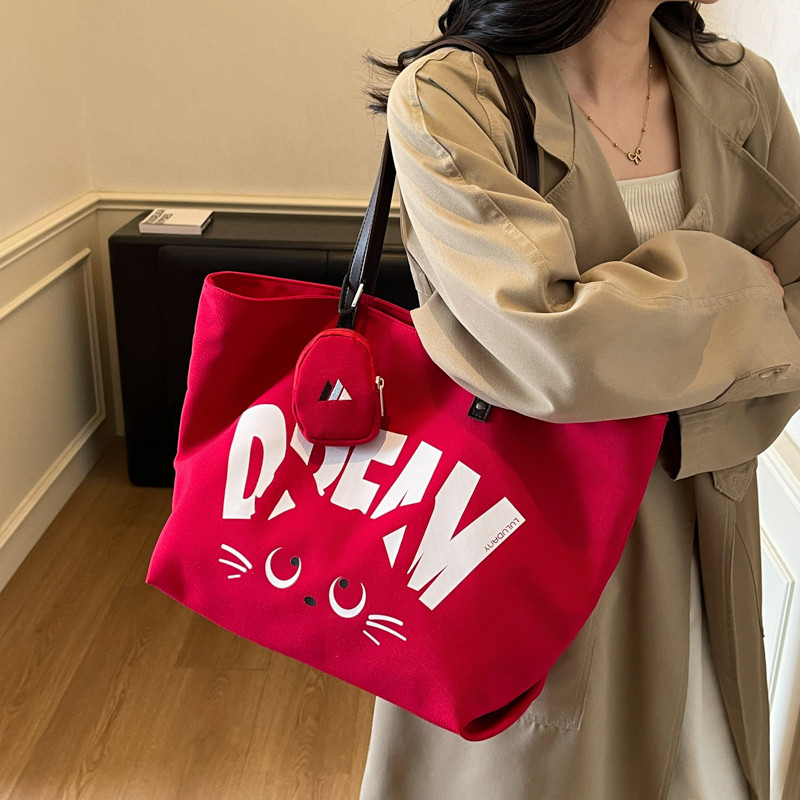 2026新款大容量帆布包女款可爱猫咪字母单肩帆布包通勤上课托特包