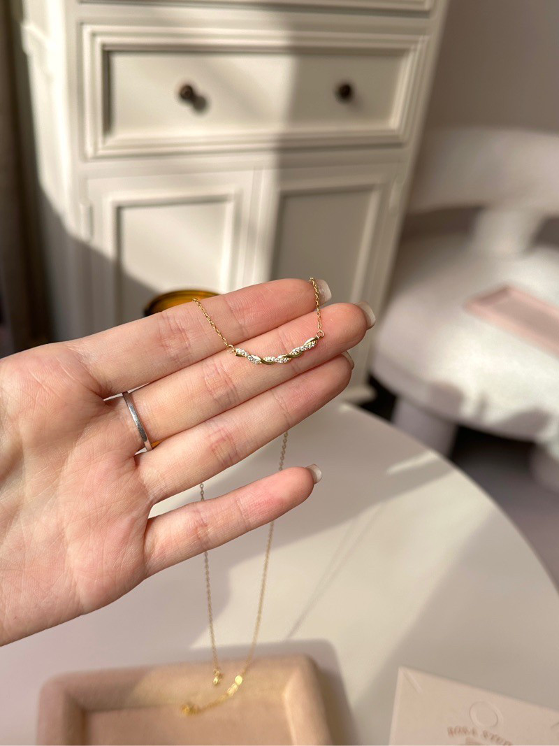 S925纯银轻奢爆款麻花结微笑项链
