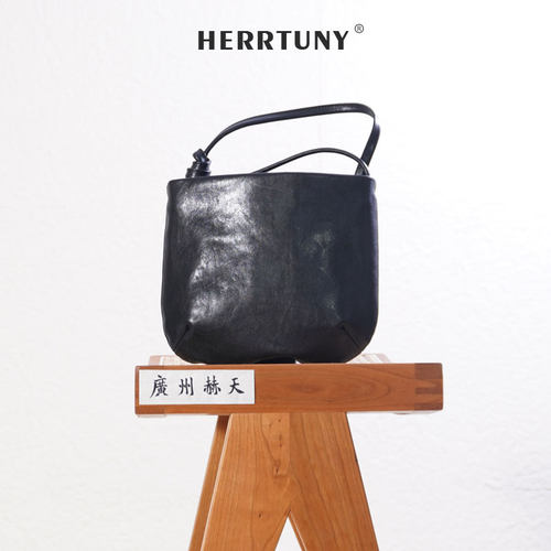 赫天herrtuny2024新品极简风复古植鞣牛皮福铃包单肩斜挎包马鞍包