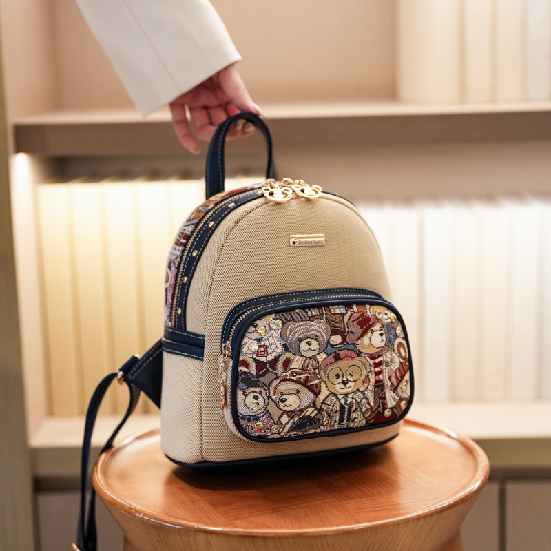 2026新款双肩包女可爱卡通小熊刺绣帆布书包小众设计撞色通勤背包