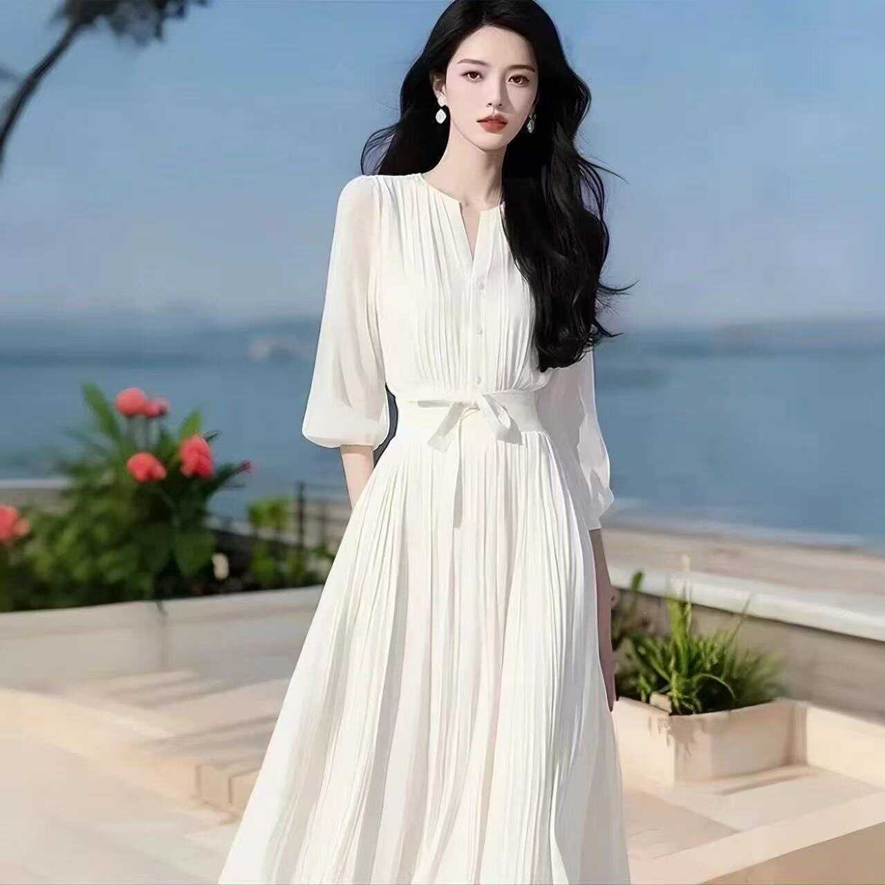 压褶碎花法式度假挂脖显瘦海边百褶大摆长裙吊带连衣裙女气质纯欲