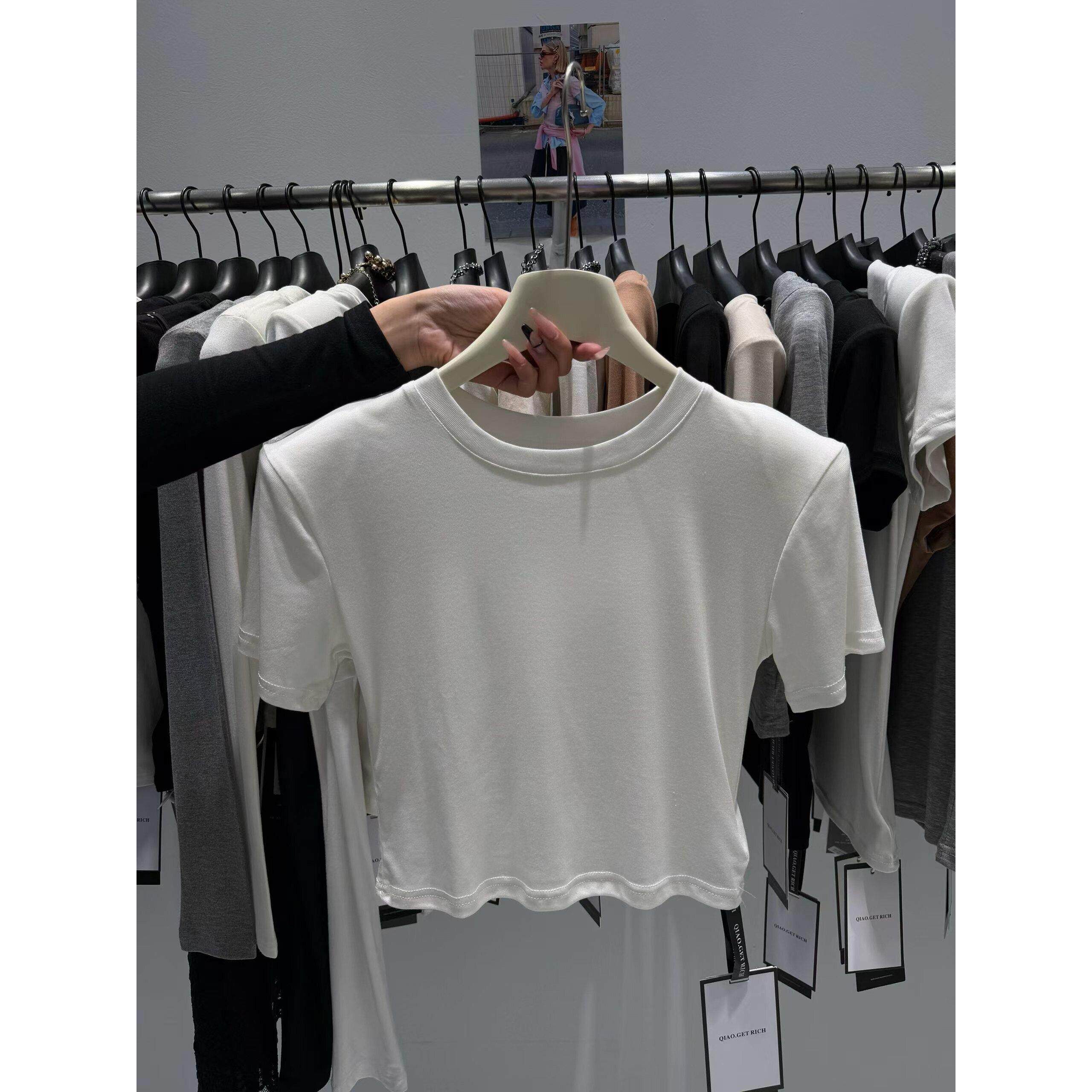 韩式极简风纯色圆领短袖T恤女2026夏季垫肩白色修身显瘦百搭上衣