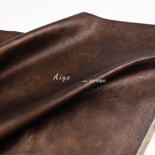 光泽亲肤 棕褐色扎染皮革廓形感褶皱肌理PU仿皮面料夹克外套布料