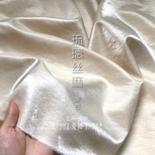 高品质幻色浅杏色光泽细腻垂感亚麻时装 琉璃丝麻 面料连衣裙布料