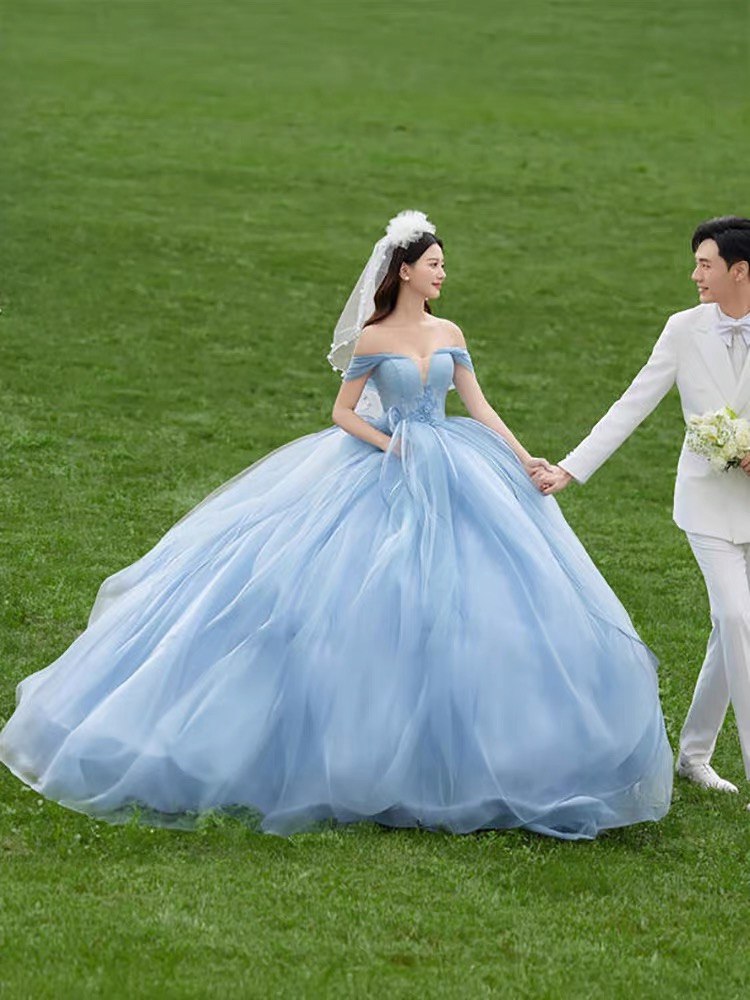 影楼主题服装新款外景草坪情侣拍照写真长礼服蓝色蛋糕公主裙婚纱
