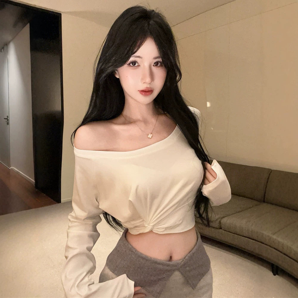 扭结设计个性斜肩修身露肩长袖T恤纯欲辣妹短款露脐显瘦独特上衣
