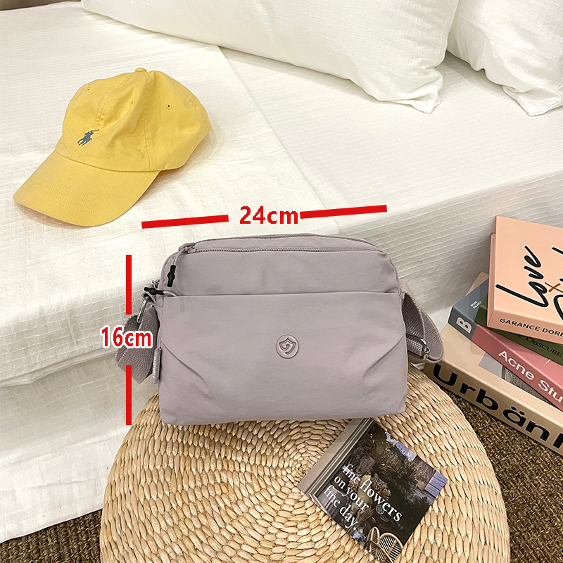 多隔层斜挎包休闲百搭多口袋布包