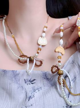 可爱系多元素蝴蝶结狗狗双层串珠项链女小众百搭度假拍照锁骨链