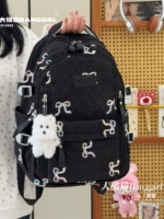 Черная школьная сумка + белый западный нагорья собака