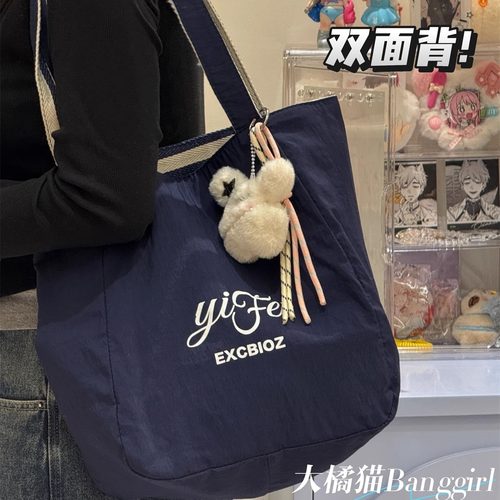 韩国潮条纹简约双面帆布包2025新款夏季大容量学生托特包购物袋包