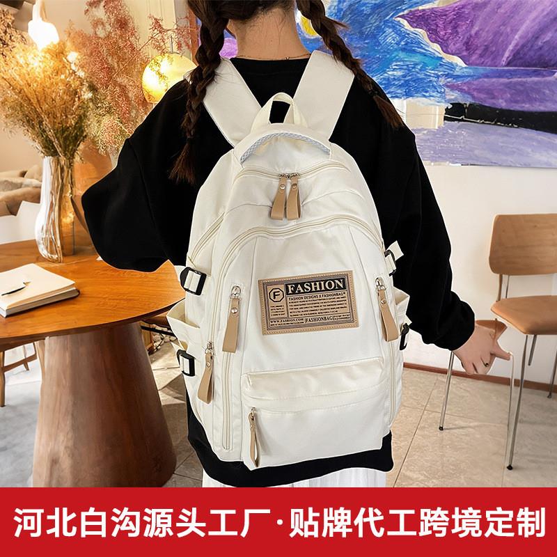 .女式高中生书包学院风大容量双肩包初学生书包工装织带设计上课