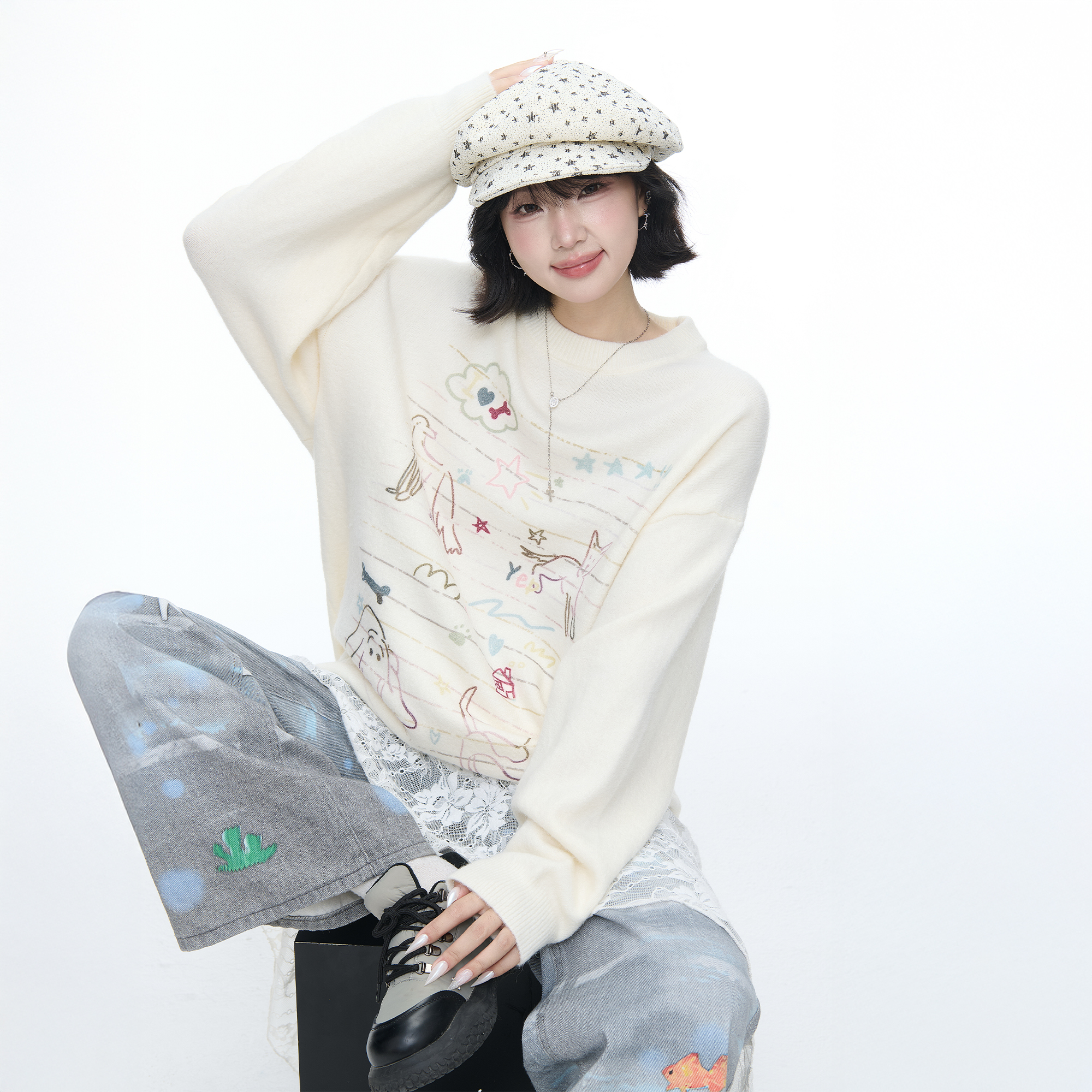 美式卡通印花圆领白色毛衣秋冬女2025新款设计感宽松圆领针织上衣