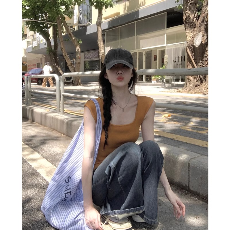 2025初夏多巴胺穿搭橘色冰丝针织吊带背心女夏外穿中长款无袖上衣