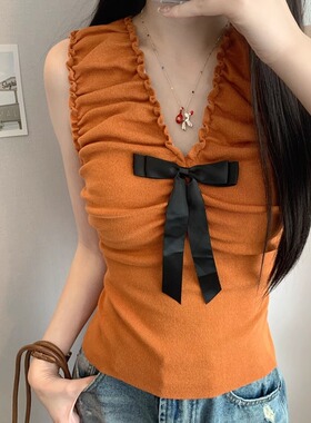 2025夏季新款度假风设计感辣妹纯欲蝴蝶结针织V领南瓜橘色背心女