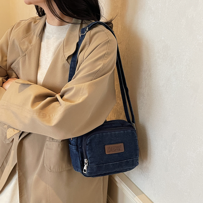 日系新款韩版男包牛仔包女士斜挎单肩包休闲商务多袋包横款复古潮