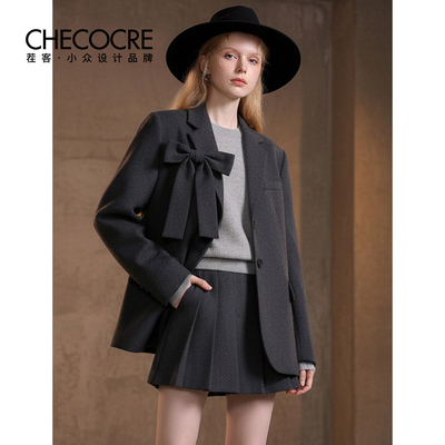 茬客新款蝴蝶结外套百褶裙