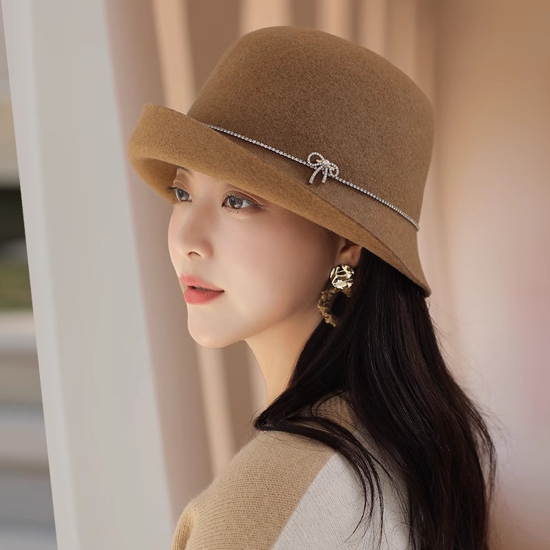 香雪羽秀羊毛帽子女秋冬季女士