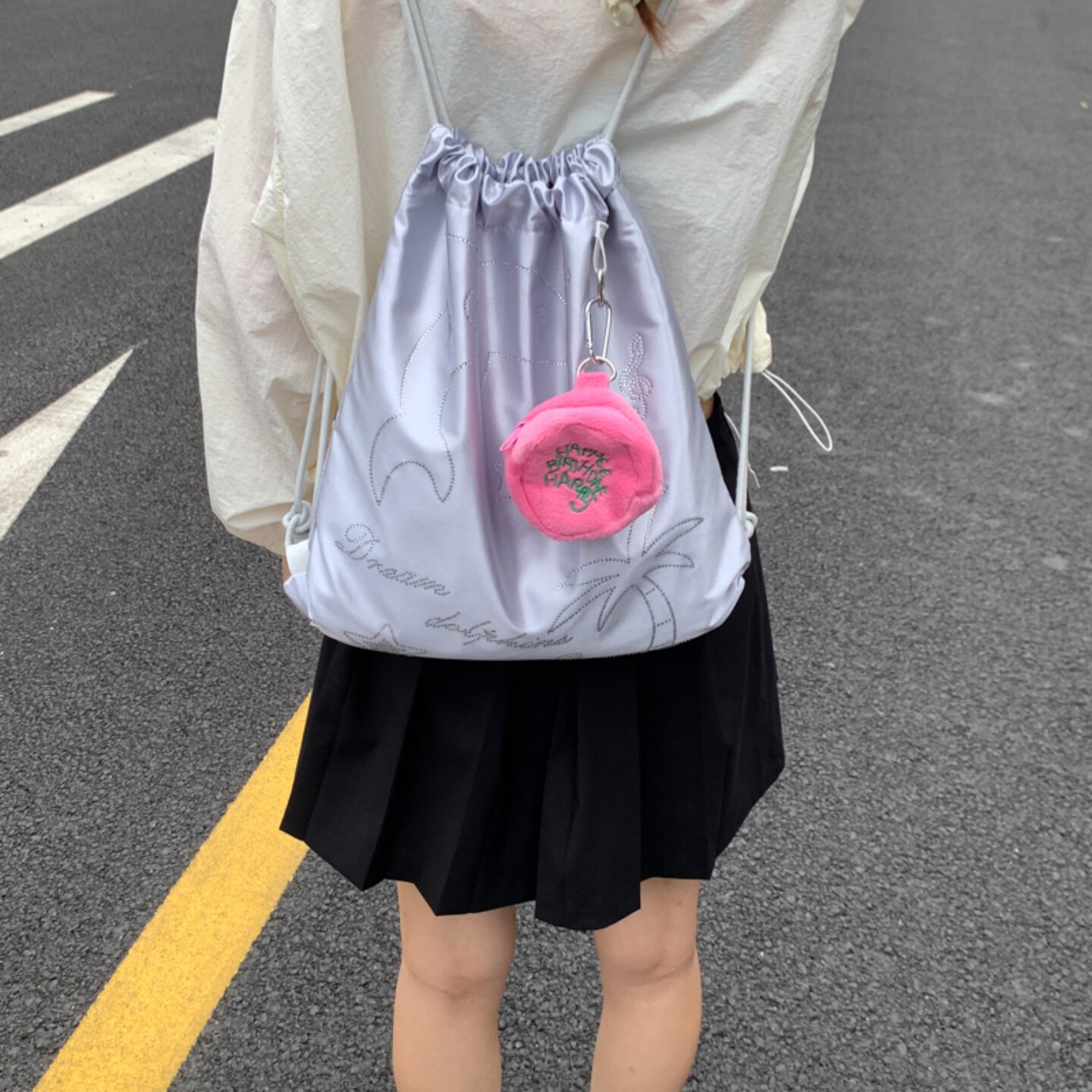 小众卡通烫钻女童束口双肩包