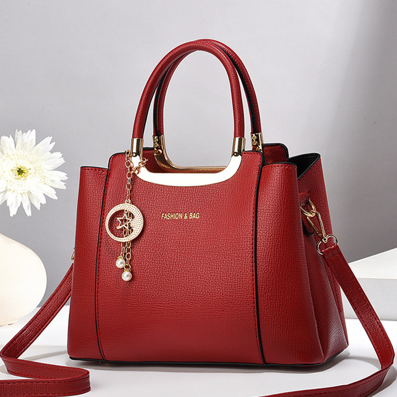 红色包包喜宴手提包女士大气新娘婚包大容量高级感2026新款斜挎包