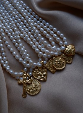 天然珍珠项链游七月钛钢吊坠钛钢