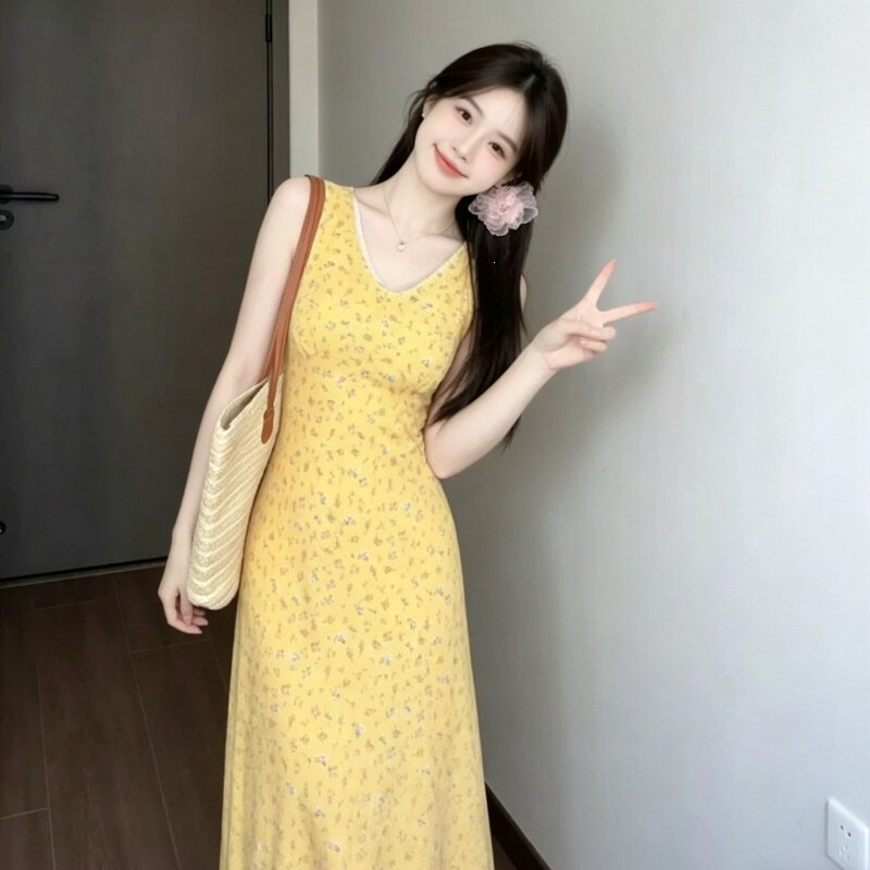 法式黄色碎花吊带连衣裙子女装夏季新款小个子海边度假风长裙