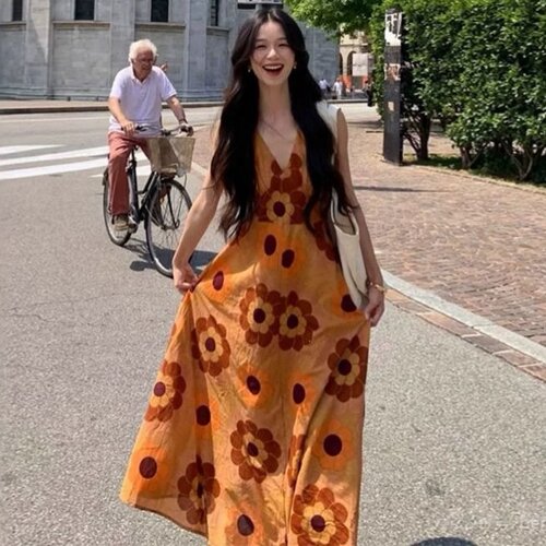 法式复古橘色v领印花吊带连衣裙女海边度假修身显瘦波西米亚长裙