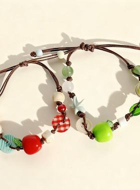 苹果乐园手工编织小众彩色串珠手链纽扣可爱甜美清新2026新款手饰
