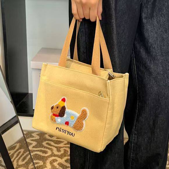 新款高颜值腊肠狗帆布手提包外出简约便携上班通勤小拎包便当包