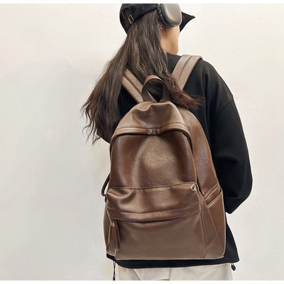 香港2025防水耐脏真皮书包女大学生简约旅行背包高颜值时尚双肩包