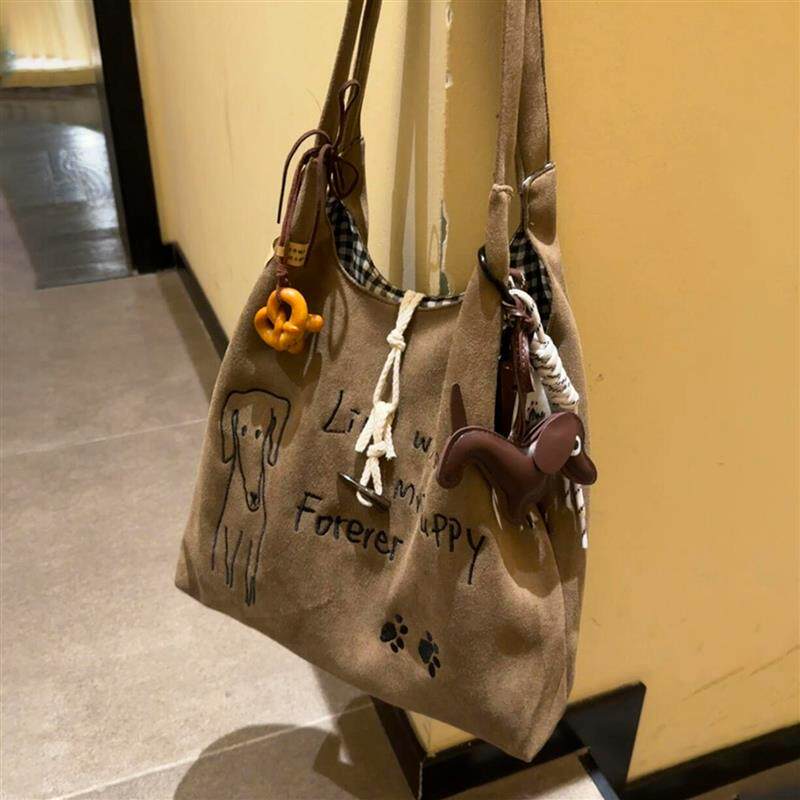 小狗托特包包女2025新款大容量单肩包上班通勤电脑包日系复古卡通