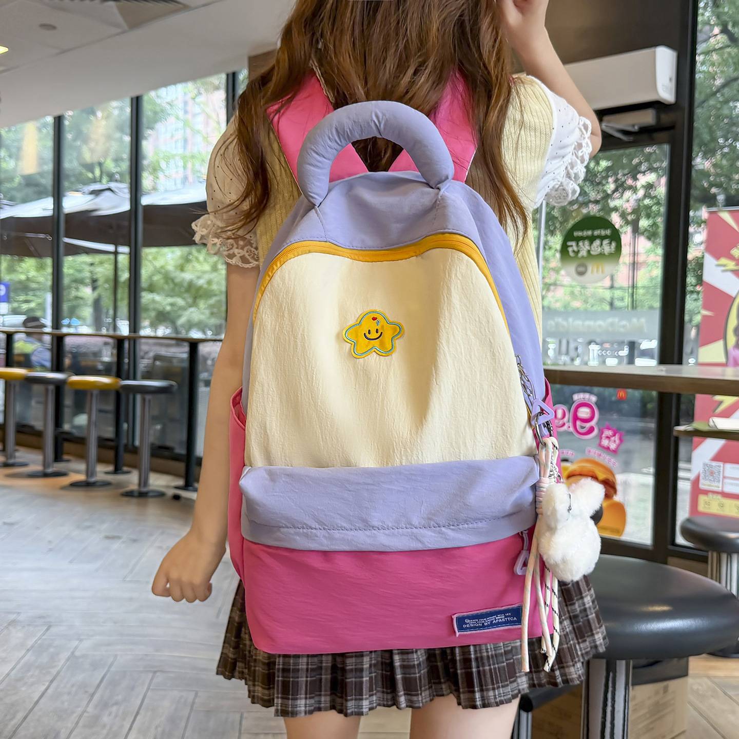 品牌专柜新款韩版女学生书包可爱双肩包卡通拼色大容量揹包高颜值