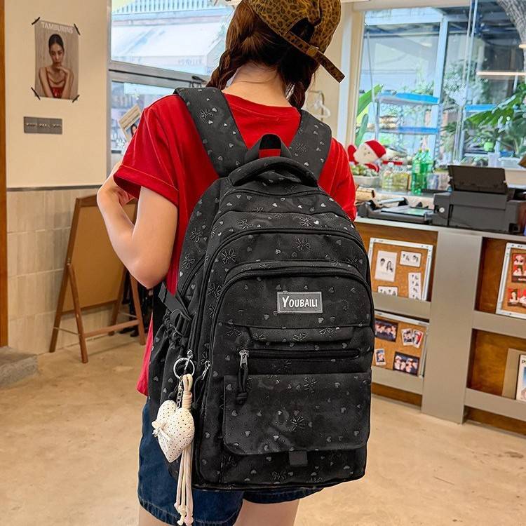品牌专柜酷感低调黑色满印爱心雪花背包多层分格大容量中小学生轻
