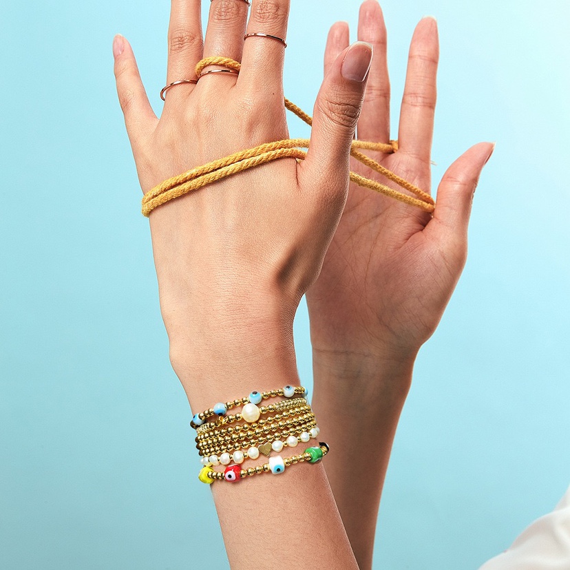 ins小众欧美简约天然珍珠编织18K金珠串珠多层叠戴恶魔之眼手链女