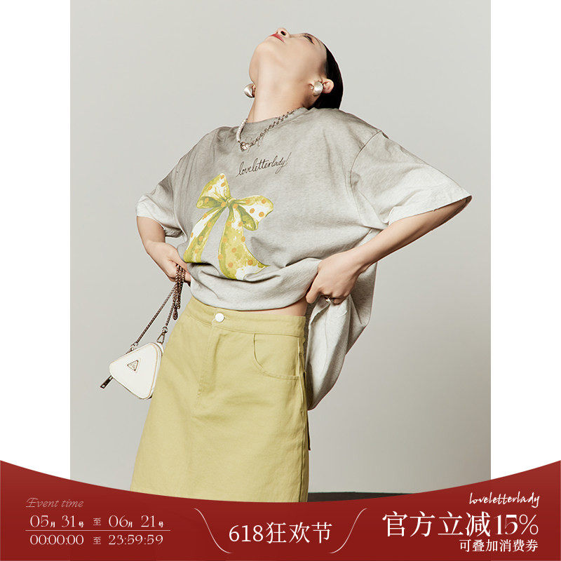 周里物/多巴胺黄色bm风纯色半身包臀a字短裙遮胯显瘦高腰女