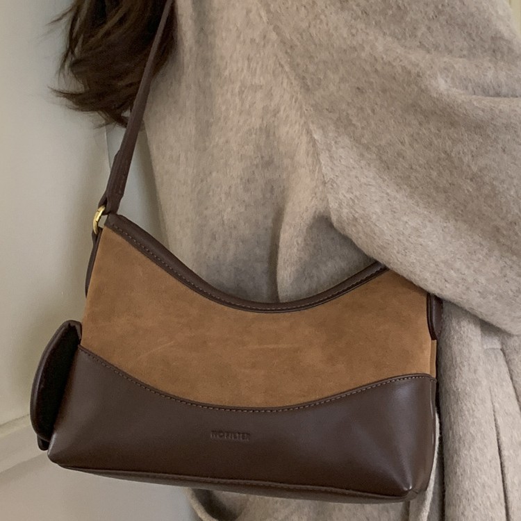 磨砂包包女式2025新款通勤包秋冬高级感流行复古单肩包斜挎水桶包