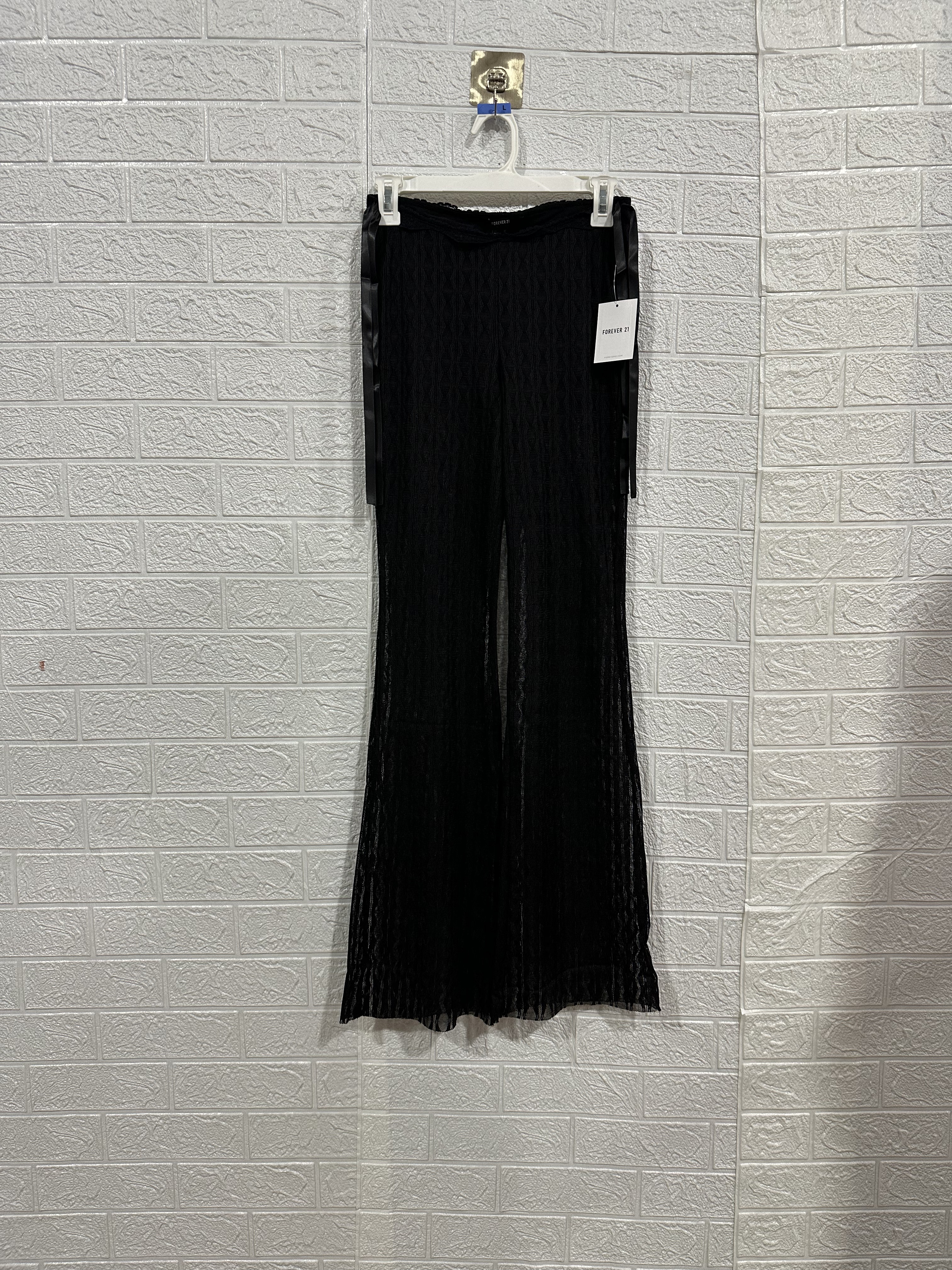 欧美时尚潮流外贸品牌个性设计性感镂空透视蕾丝松紧腰微喇休闲裤