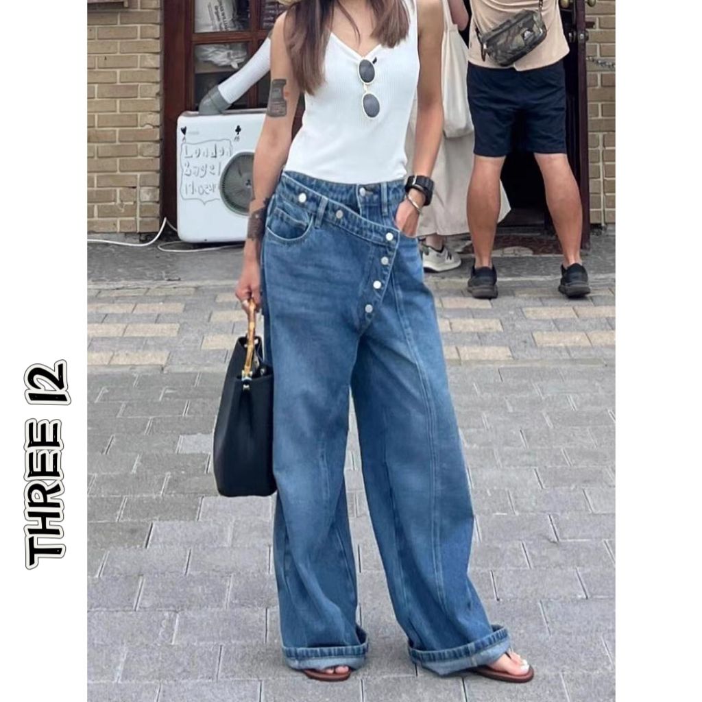 美式高街不规则排扣牛仔裤女2025春设计感错位拼接宽松显瘦阔腿裤